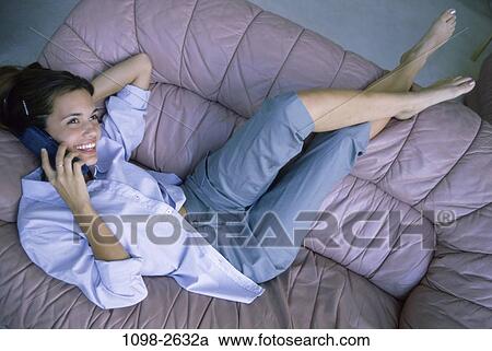 overhead, people, smiling, telephone, talking, phone, couch View Large Photo Image Stock Image - overhead, people, smiling, telephone, talking, phone, couch. Fotosearch