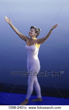 peace, people, water, woman, raised, stretching, leotard View Large Photo Image Stock Image - peace, people, water, woman, raised, stretching, leotard. Fotosearch