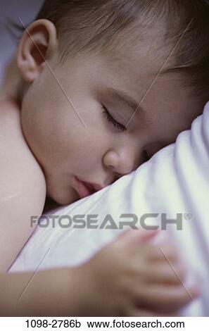 Stock Image - people, baby, Babies asleep crib. Fotosearch