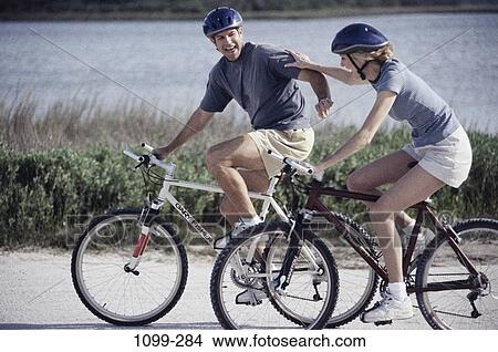 people, balance, water, playing, road, couple View Large Photo Image Picture - people, balance, water, playing, road, couple. Fotosearch