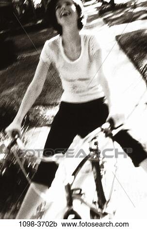 people, balance, woman, bicycle, laughing, riding, outdoors View Large Photo Image Stock Image - people, balance, woman, bicycle, laughing, riding, outdoors. Fotosearch