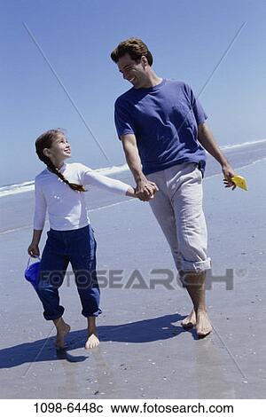 Stock Image - people, beach, family, father, parent, Fathers outdoors water. Fotosearch