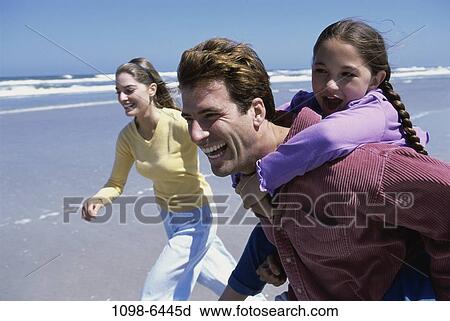 Stock Image - people, beach, family, parents, Families recreation water. Fotosearch