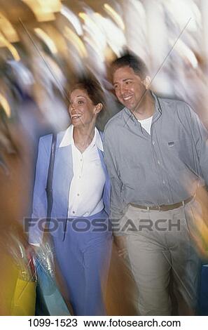 people, blur, couple, motion, Middle-aged, joyous, shopping View Large Photo Image Stock Image - people, blur, couple, motion, Middle-aged, joyous, shopping. Fotosearch