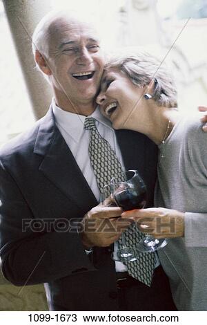 people, celebration, couple, senior, wine, drinking, laughing View Large Photo Image Stock Image - people, celebration, couple, senior, wine, drinking, laughing. Fotosearch
