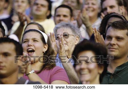 people, clapping, outdoors, celebrating, cheering, crowd View Large Photo Image Stock Photo - people, clapping, outdoors, celebrating, cheering, crowd. Fotosearch
