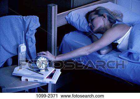 people, clock, woman, telephone, sleeping, books View Large Photo Image Stock Image - people, clock, woman, telephone, sleeping, books. Fotosearch