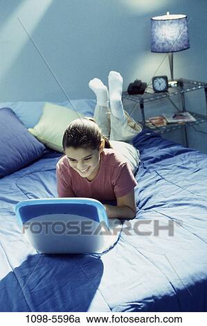people, computer, laptop, using, brunette, indoors View Large Photo Image Stock Image - people, computer, laptop, using, brunette, indoors. Fotosearch