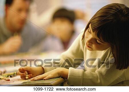 people, concentration, coloring, creative, girl, concentrating, contemplation View Large Photo Image Stock Image - people, concentration, coloring, creative, girl, concentrating, contemplation. Fotosearch