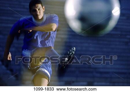 Stock Image - people, concentration, Hispanic, evening, ball, concentrating. Fotosearch