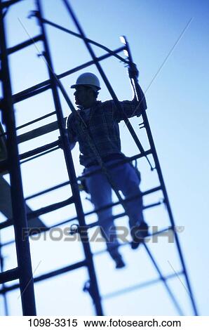 Stock Photography - people, construction, climbing, height, silhouette, scaffold. Fotosearch