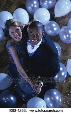 people, couple, dancing, nightlife, indoors, young adult, Young couples nightlife View Large Photo Image Stock Image - people, couple, dancing, nightlife, indoors, young adult, Young couples nightlife. Fotosearch