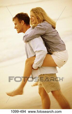 people, couple, friendship, happy, playful, lifestyles, embracing View Large Photo Image Picture - people, couple, friendship, happy, playful, lifestyles, embracing. Fotosearch