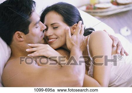 people, couple, Hispanic, bed, romantic, embracing, romance View Large Photo Image Stock Image - people, couple, Hispanic, bed, romantic, embracing, romance. Fotosearch