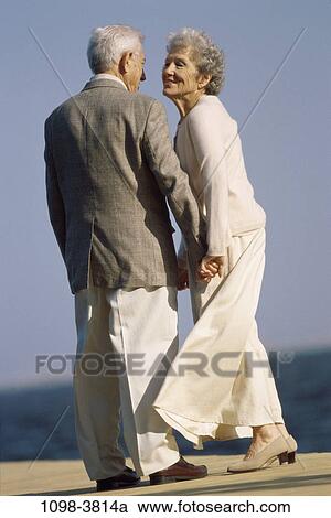 people, couple, senior, windy, outdoors, romantic, dock View Large Photo Image Stock Image - people, couple, senior, windy, outdoors, romantic, dock. Fotosearch
