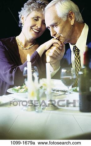 people, couple, senior, wine, romantic, dining out, restaurant View Large Photo Image Stock Image - people, couple, senior, wine, romantic, dining out, restaurant. Fotosearch