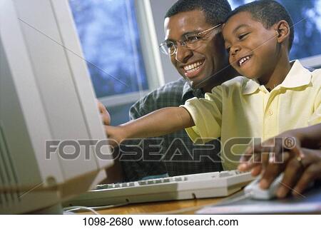 people, desk, home, smiling, eyeglasses, technology, computer View Large Photo Image Stock Image - people, desk, home, smiling, eyeglasses, technology, computer. Fotosearch