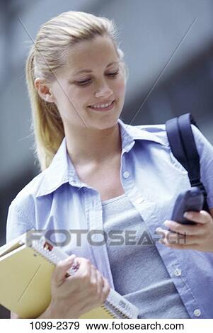 people, dial, dialing, smiling, telephone, talking, phone View Large Photo Image Stock Photo - people, dial, dialing, smiling, telephone, talking, phone. Fotosearch