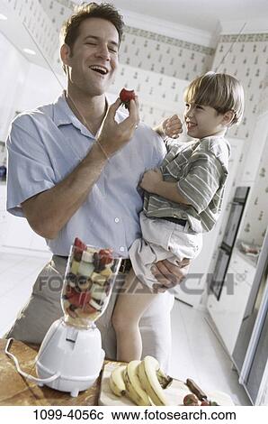 people, eating, fruit, holding, strawberry, family View Large Photo Image Stock Image - people, eating, fruit, holding, strawberry, family. Fotosearch