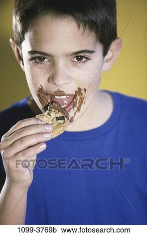 people, eating, Hispanic, chocolate, mouth, boy, child View Large Photo Image Stock Image - people, eating, Hispanic, chocolate, mouth, boy, child. Fotosearch