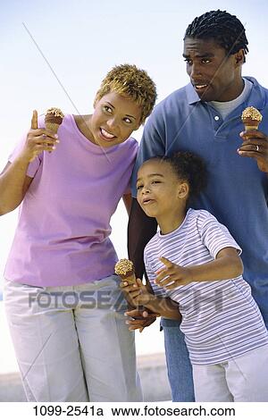 people, eating, ice cream, holding, pointing, outdoors, point View Large Photo Image Stock Image - people, eating, ice cream, holding, pointing, outdoors, point. Fotosearch