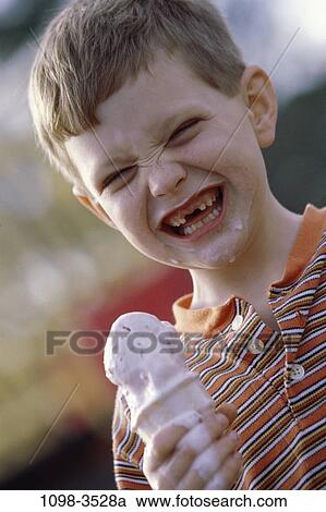 people, eating, smiling, face, licking, ice cream, boy View Large Photo Image Stock Image - people, eating, smiling, face, licking, ice cream, boy. Fotosearch