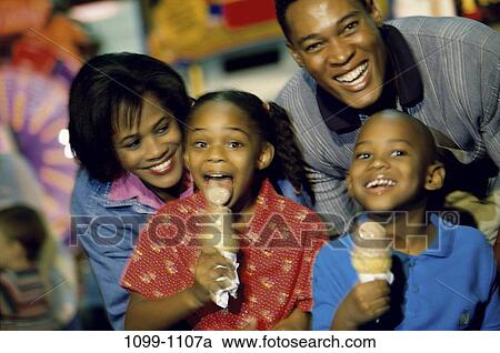 people, eating, smiling, licking, ice cream, laughing, leaning View Large Photo Image Stock Image - people, eating, smiling, licking, ice cream, laughing, leaning. Fotosearch