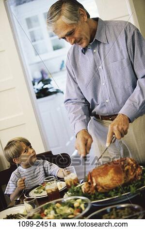 people, eating, table, sitting, plates, food View Large Photo Image Stock Image - people, eating, table, sitting, plates, food. Fotosearch