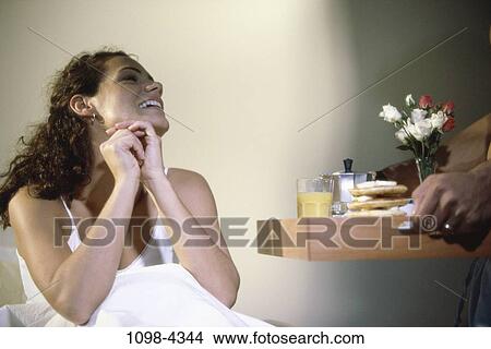 people, eating, woman, morning, breakfast, bed, surprise View Large Photo Image Picture - people, eating, woman, morning, breakfast, bed, surprise. Fotosearch