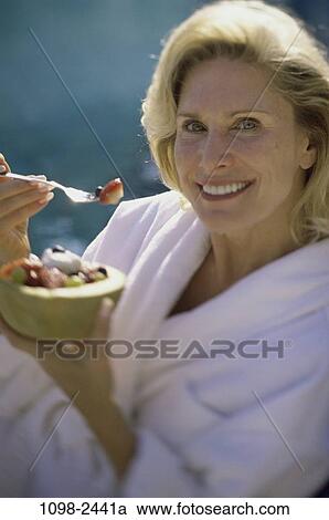 people, eating, woman, smiling, healthy, fork, fruit View Large Photo Image Stock Image - people, eating, woman, smiling, healthy, fork, fruit. Fotosearch