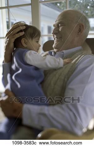 people, family, grandchild, indoors, grandparent, grandkid, Grandparents indoors View Large Photo Image Stock Image - people, family, grandchild, indoors, grandparent, grandkid, Grandparents indoors. Fotosearch