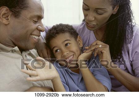 people, family, parents, indoors, Families indoors various View Large Photo Image Stock Image - people, family, parents, indoors, Families indoors various. Fotosearch