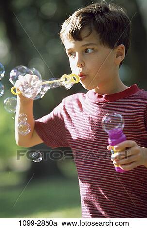 people, floating, playing, bottle, bubbles, boy, outdoors View Large Photo Image Stock Image - people, floating, playing, bottle, bubbles, boy, outdoors. Fotosearch