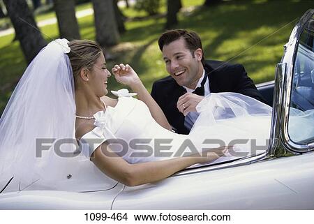 people, formal, smiling, couple, car, convertible View Large Photo Image Picture - people, formal, smiling, couple, car, convertible. Fotosearch