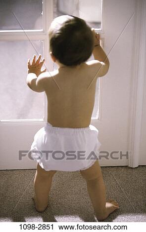 people, glass, diaper, door, window, baby, girl View Large Photo Image Stock Image - people, glass, diaper, door, window, baby, girl. Fotosearch