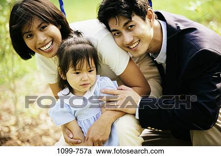 people, ground, Asian, toddler, holding, outdoors, family View Large Photo Image Stock Image - people, ground, Asian, toddler, holding, outdoors, family. Fotosearch