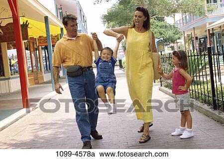 people, hands, playing, walking, swinging, holding View Large Photo Image Stock Image - people, hands, playing, walking, swinging, holding. Fotosearch
