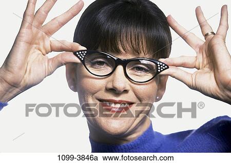 people, hands, woman, eyeglasses, stylish, Hispanic View Large Photo Image Stock Image - people, hands, woman, eyeglasses, stylish, Hispanic. Fotosearch