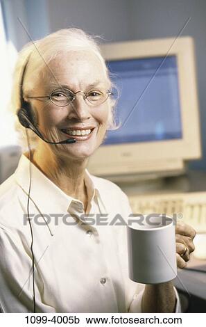 people, headset, coffee, senior, computer, mug, drinking View Large Photo Image Stock Image - people, headset, coffee, senior, computer, mug, drinking. Fotosearch