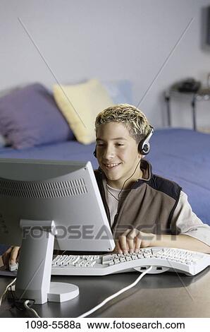 people, headset, male, listening, computer, using View Large Photo Image Stock Image - people, headset, male, listening, computer, using. Fotosearch