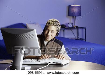 people, headset, male, listening, computer, typing, using View Large Photo Image Stock Image - people, headset, male, listening, computer, typing, using. Fotosearch