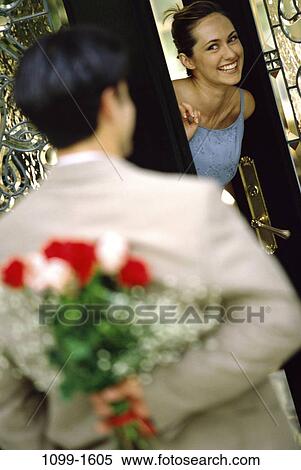 people, hiding, couple, flowers, outdoors, romantic, Middle-aged View Large Photo Image Stock Photography - people, hiding, couple, flowers, outdoors, romantic, Middle-aged. Fotosearch