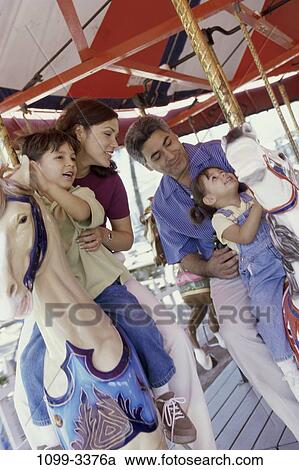 people, Hispanic, riding, outdoors, amusement, family, horses View Large Photo Image Stock Image - people, Hispanic, riding, outdoors, amusement, family, horses. Fotosearch
