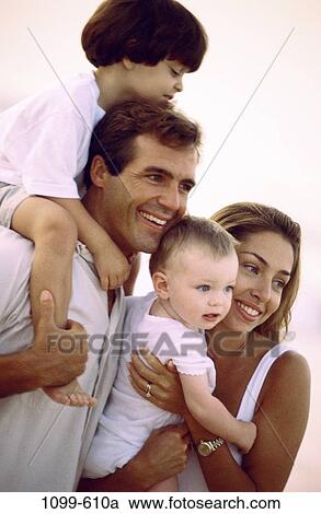 people, Hispanic, toddler, outdoors, commitment, family, posing View Large Photo Image Stock Image - people, Hispanic, toddler, outdoors, commitment, family, posing. Fotosearch