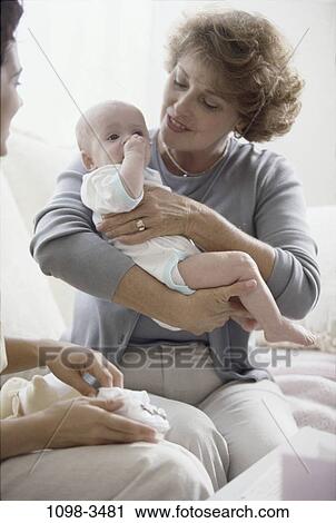 people, holding, nurturing, family, comforting, comfort View Large Photo Image Stock Image - people, holding, nurturing, family, comforting, comfort. Fotosearch