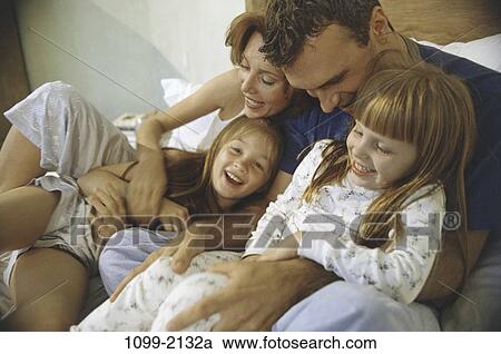 people, home, bed, happy, laughing, hugging View Large Photo Image Stock Image - people, home, bed, happy, laughing, hugging. Fotosearch