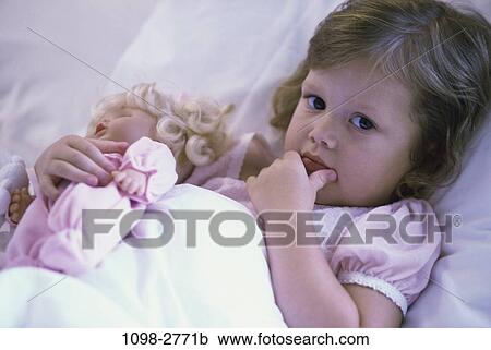 people, home, bed, toddler, doll, girl, child View Large Photo Image Stock Image - people, home, bed, toddler, doll, girl, child. Fotosearch