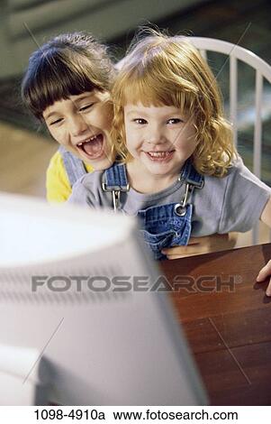 people, home, computer, friends, girls, indoors, Caucasian View Large Photo Image Stock Image - people, home, computer, friends, girls, indoors, Caucasian. Fotosearch