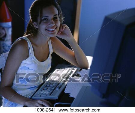 people, home, keyboard, smiling, night, computer, smile View Large Photo Image Stock Image - people, home, keyboard, smiling, night, computer, smile. Fotosearch