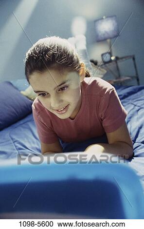 people, home, staring, technology, Hispanic, computer, laptop View Large Photo Image Stock Image - people, home, staring, technology, Hispanic, computer, laptop. Fotosearch